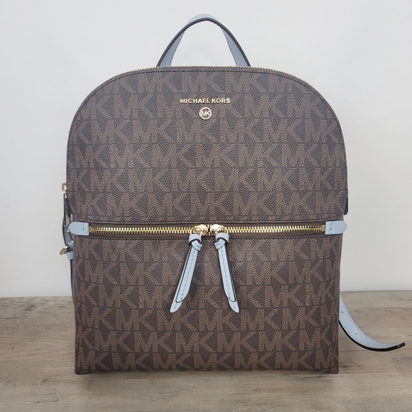 Michael Kors Handbags - Michael Kors Dallas Medium Slim Backpack Brown